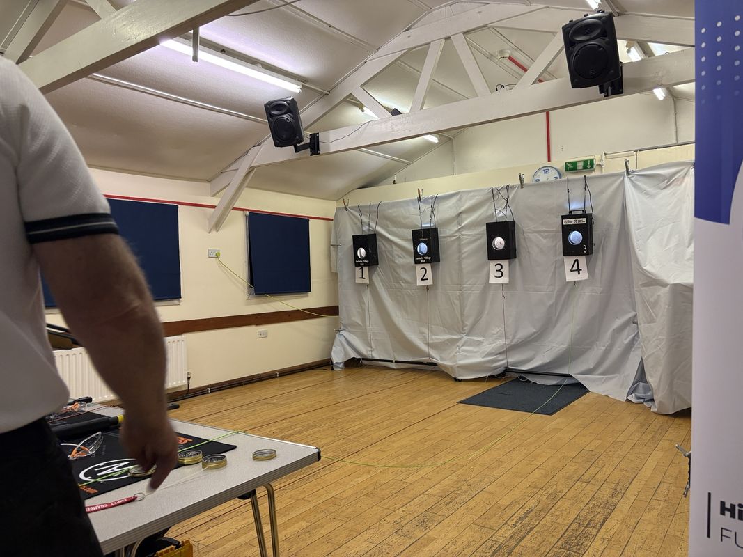 Traditional bell target shooting lanes in an indoor hall